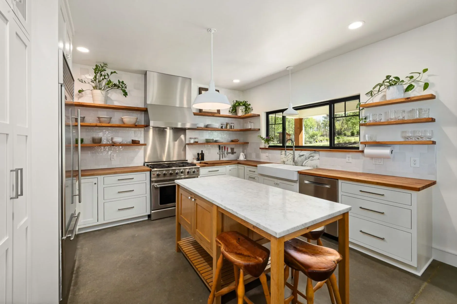 15 Wood Kitchen Ideas That Bring Warmth and Character to Any Home Bright modern kitchen with wooden accents, open shelves, and marble countertop.