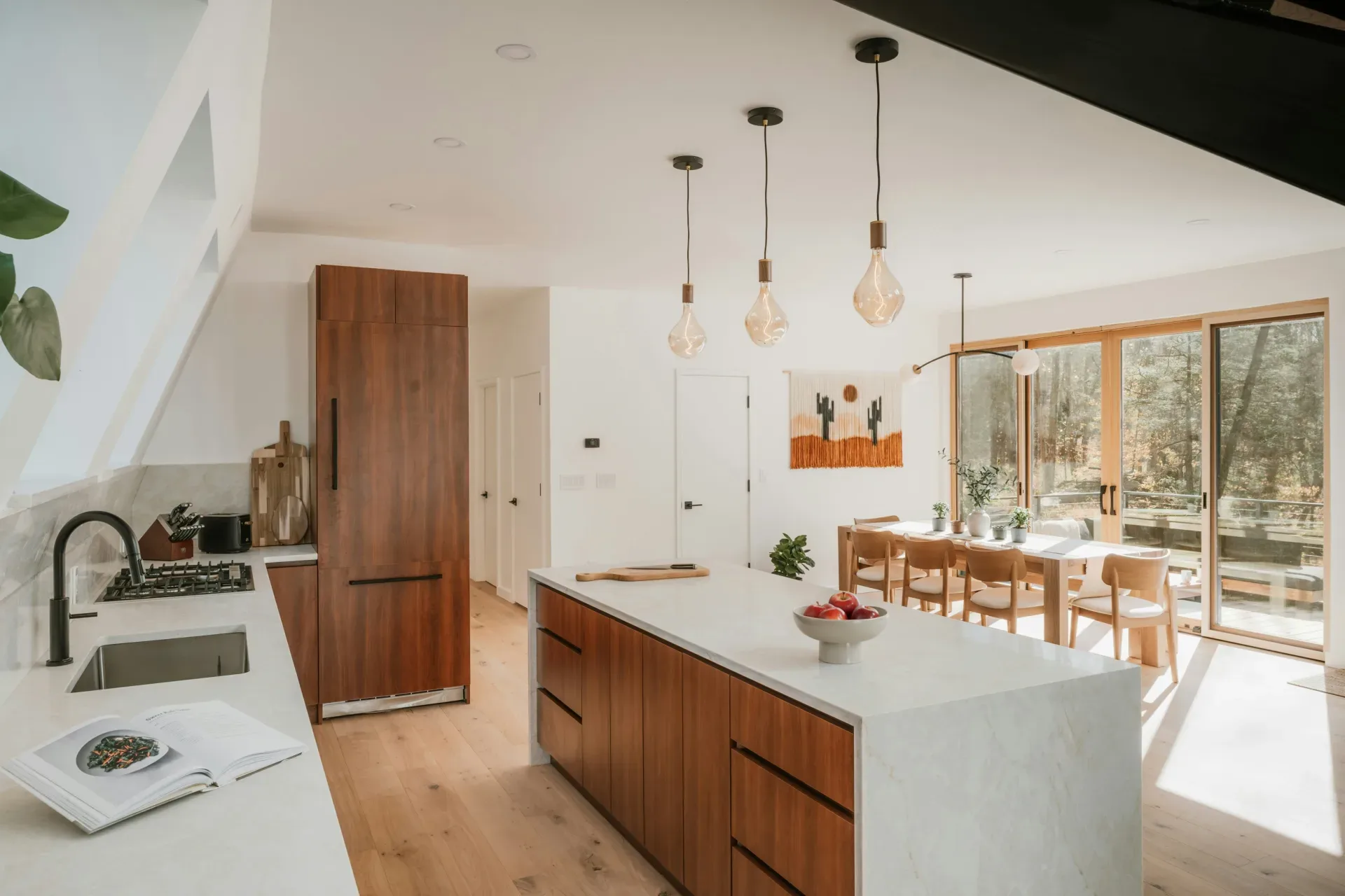 15 Wood Kitchen Ideas That Bring Warmth and Character to Any Home Modern kitchen with island and dining area