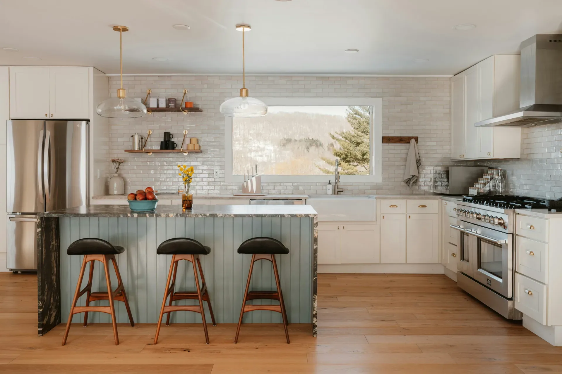 15 Wood Kitchen Ideas That Bring Warmth and Character to Any Home Modern kitchen with island and stainless steel appliances