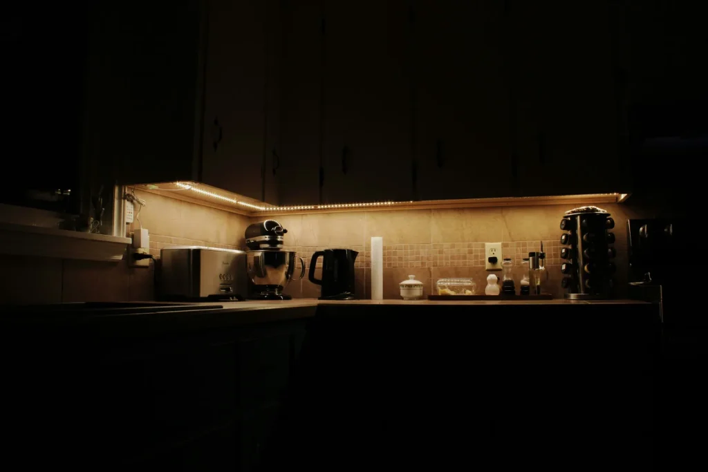 20 Cozy Kitchen Ideas That Make Cooking Feel Like the Best Part of Your Day a kitchen with a microwave, coffee maker and other appliances